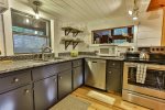 Cozy kitchen with plenty of storage and counter space